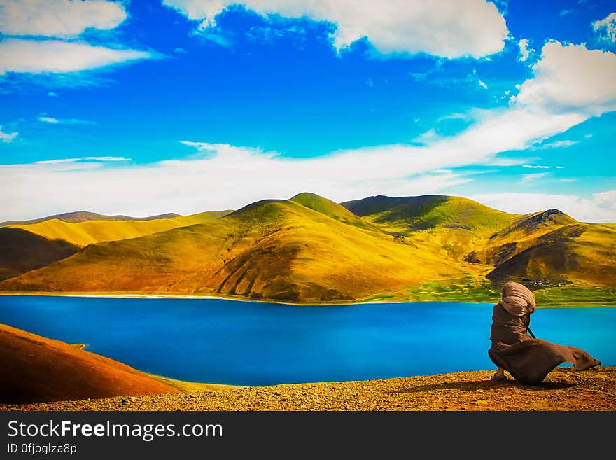 Scenic View of Lake Against Mountain