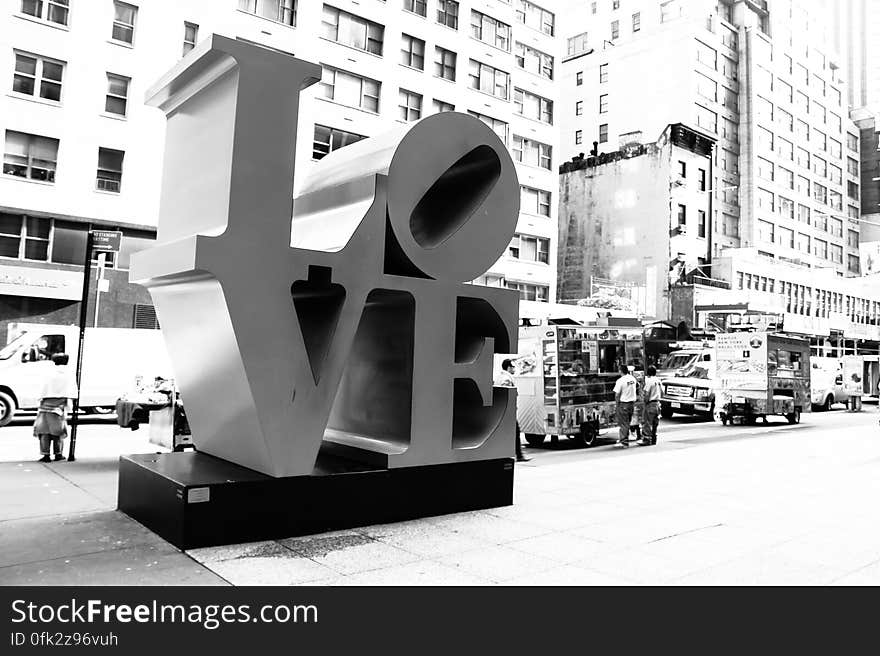 LOVE sculpture by Robert Indiana on the corner of 6th Avenue and 55th Street in Manhattan, NY.