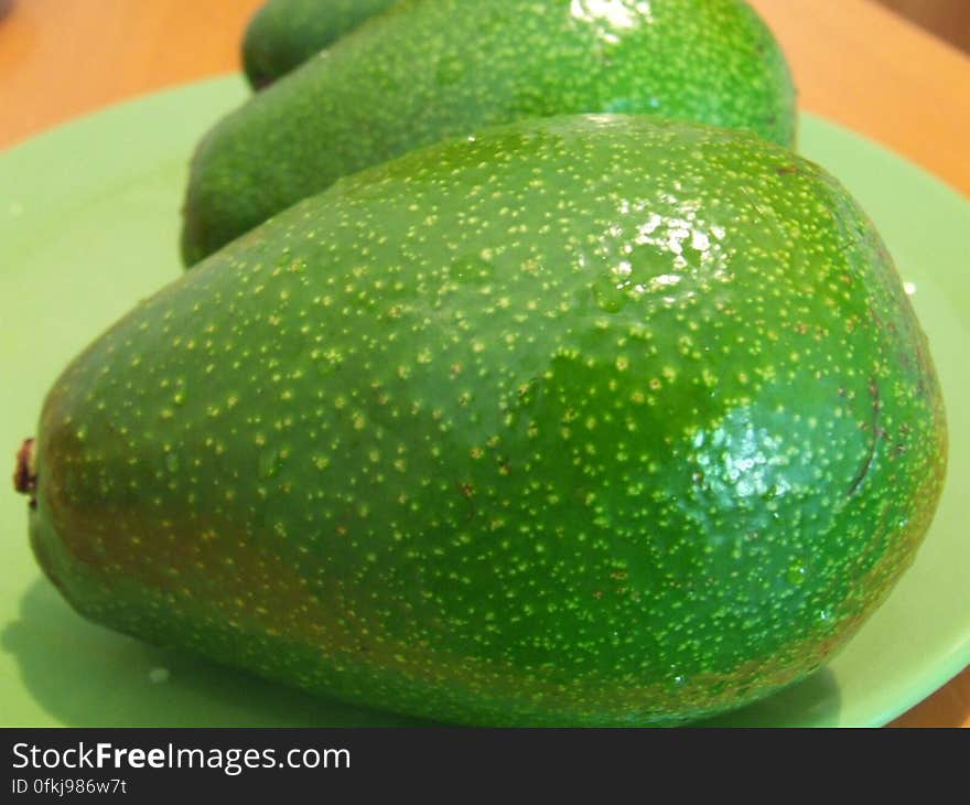 avocados-on-green-plate