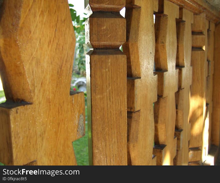 carved-wood-fence