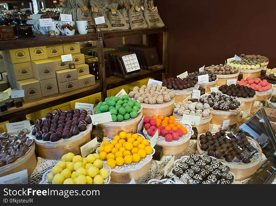 Confectionery shop in Prague offering an assortment of chocolate bombons with different flavours and coffee. Confectionery shop in Prague offering an assortment of chocolate bombons with different flavours and coffee.