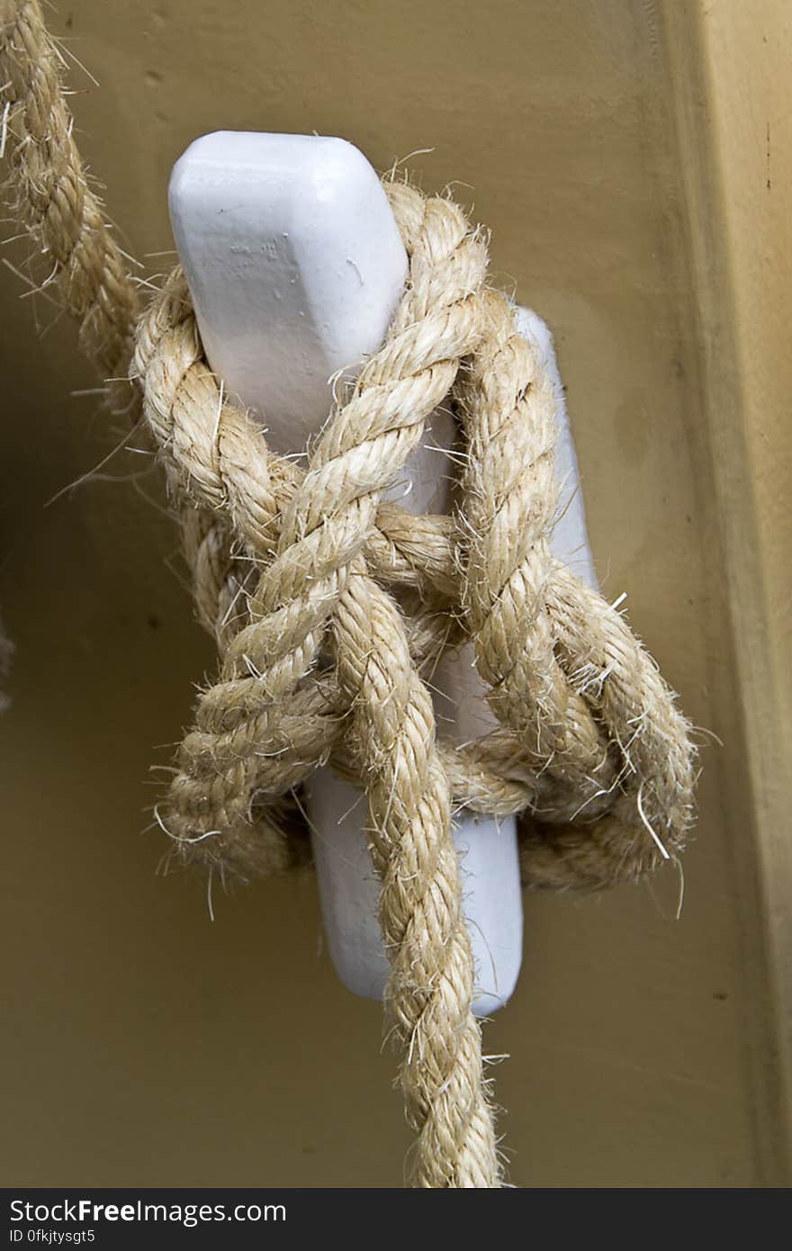 A rope secured to a horn cleat with a cleat hitch.