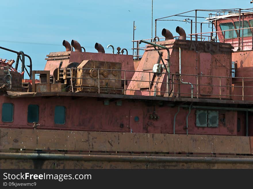 Abandoned weather-beaten fluvial ship. Abandoned weather-beaten fluvial ship.