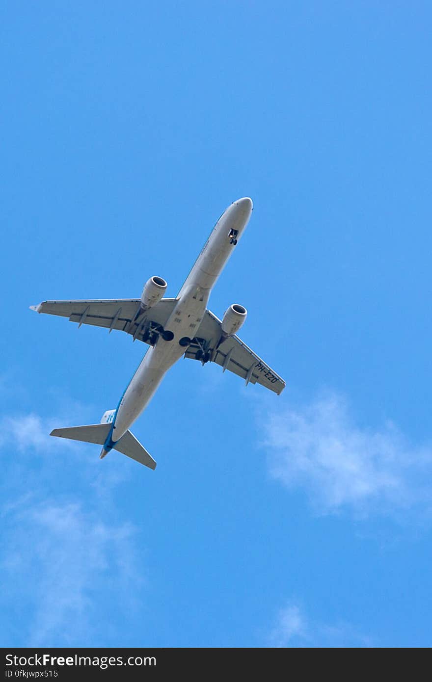 Embraer E190-100 aircraft approaching airport with landing gear extended. It is a plane used for regional flights. Embraer E190-100 aircraft approaching airport with landing gear extended. It is a plane used for regional flights.