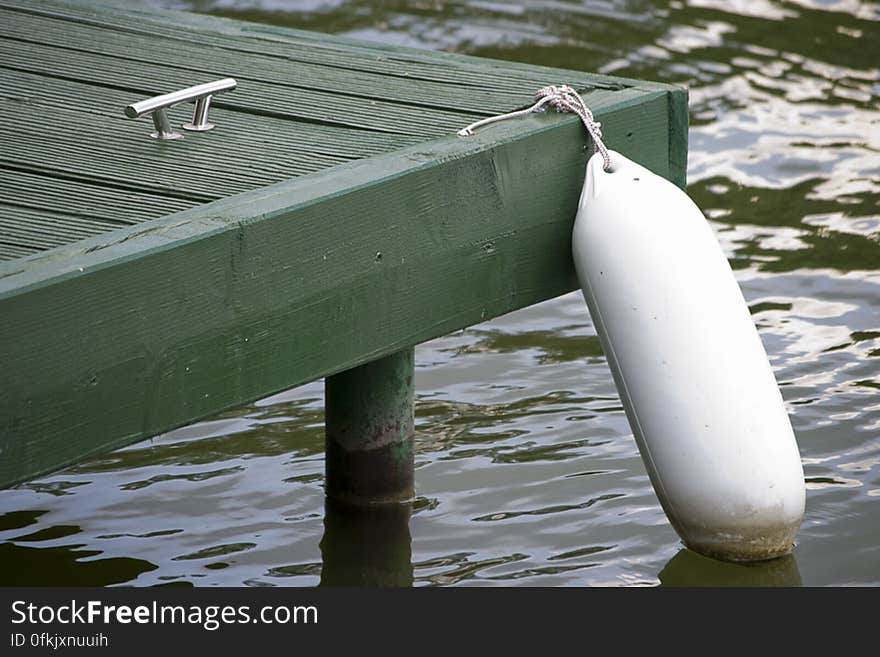 White buoy on side of pontoon. White buoy on side of pontoon