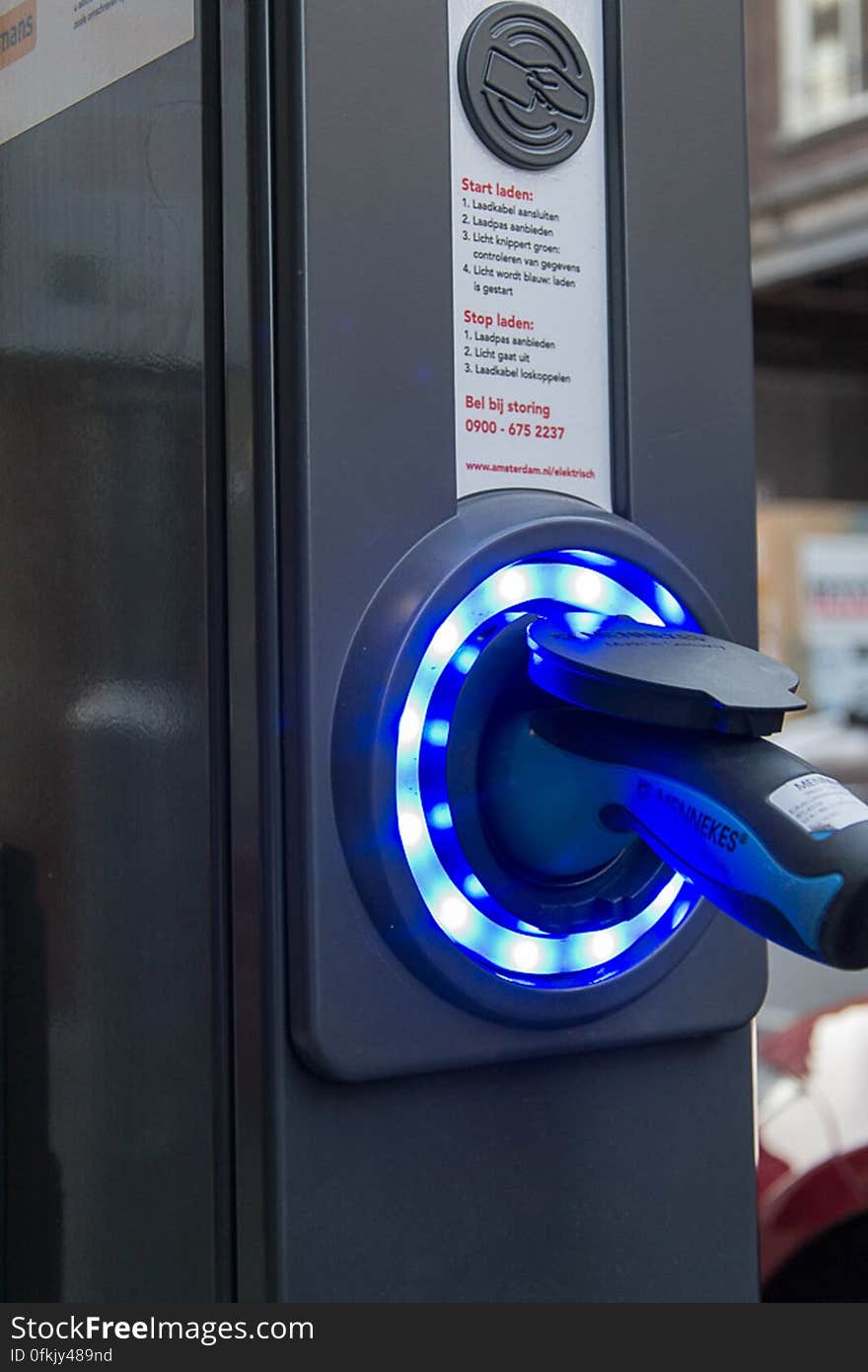 A public electric vehicle charging station supporting faster charging via special connector.