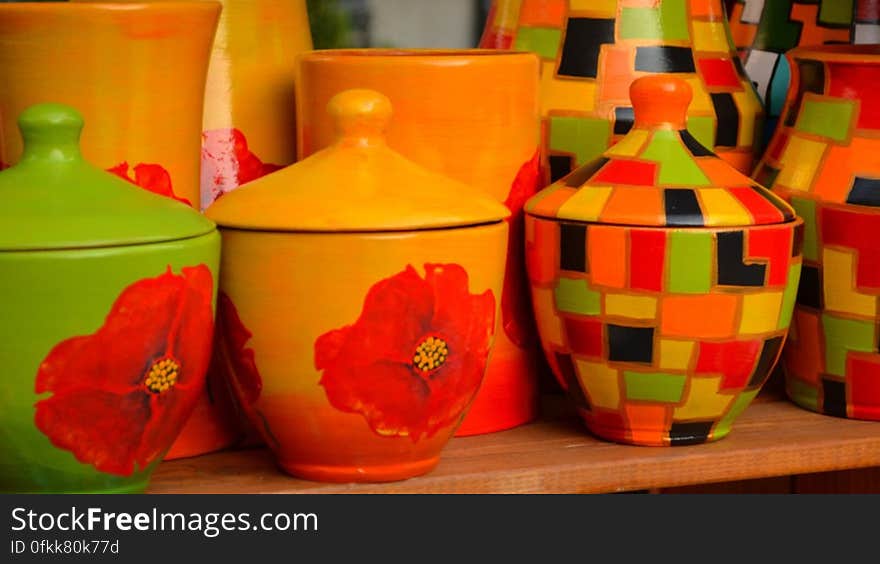 hand-painted-ceramic-pottery-with-floral-and-geometrical-motifs