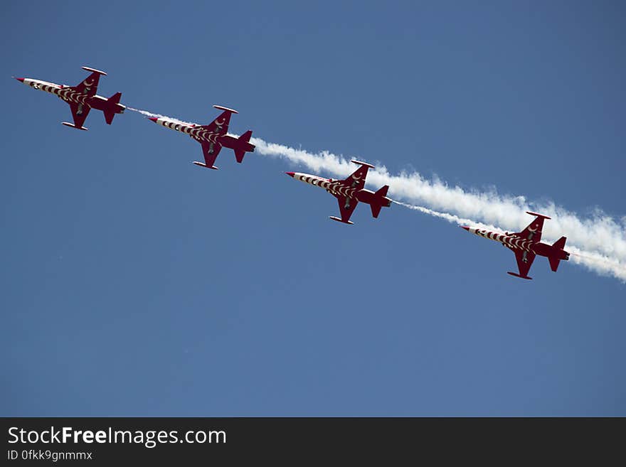 Aircrafts leaving jet traces.