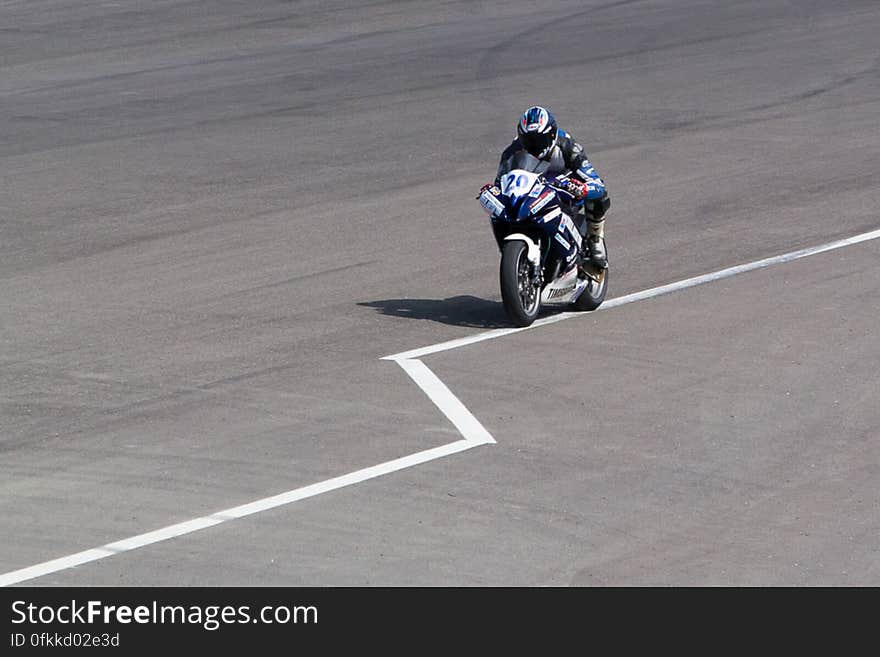 Yamaha 600 cc motorbike running on race circuit. Yamaha 600 cc motorbike running on race circuit