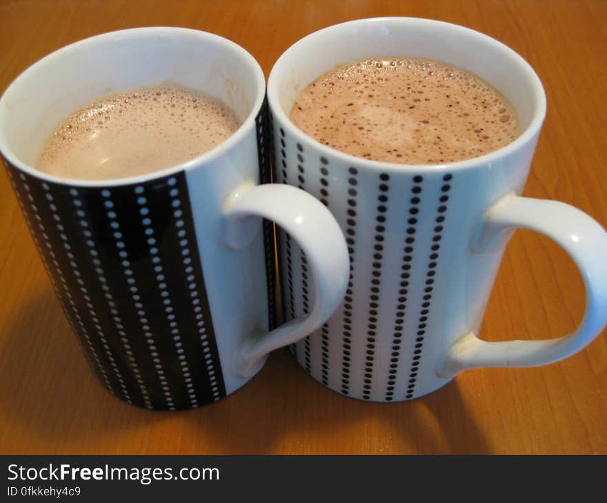 pair-of-dotted-mugs-with-chocolate