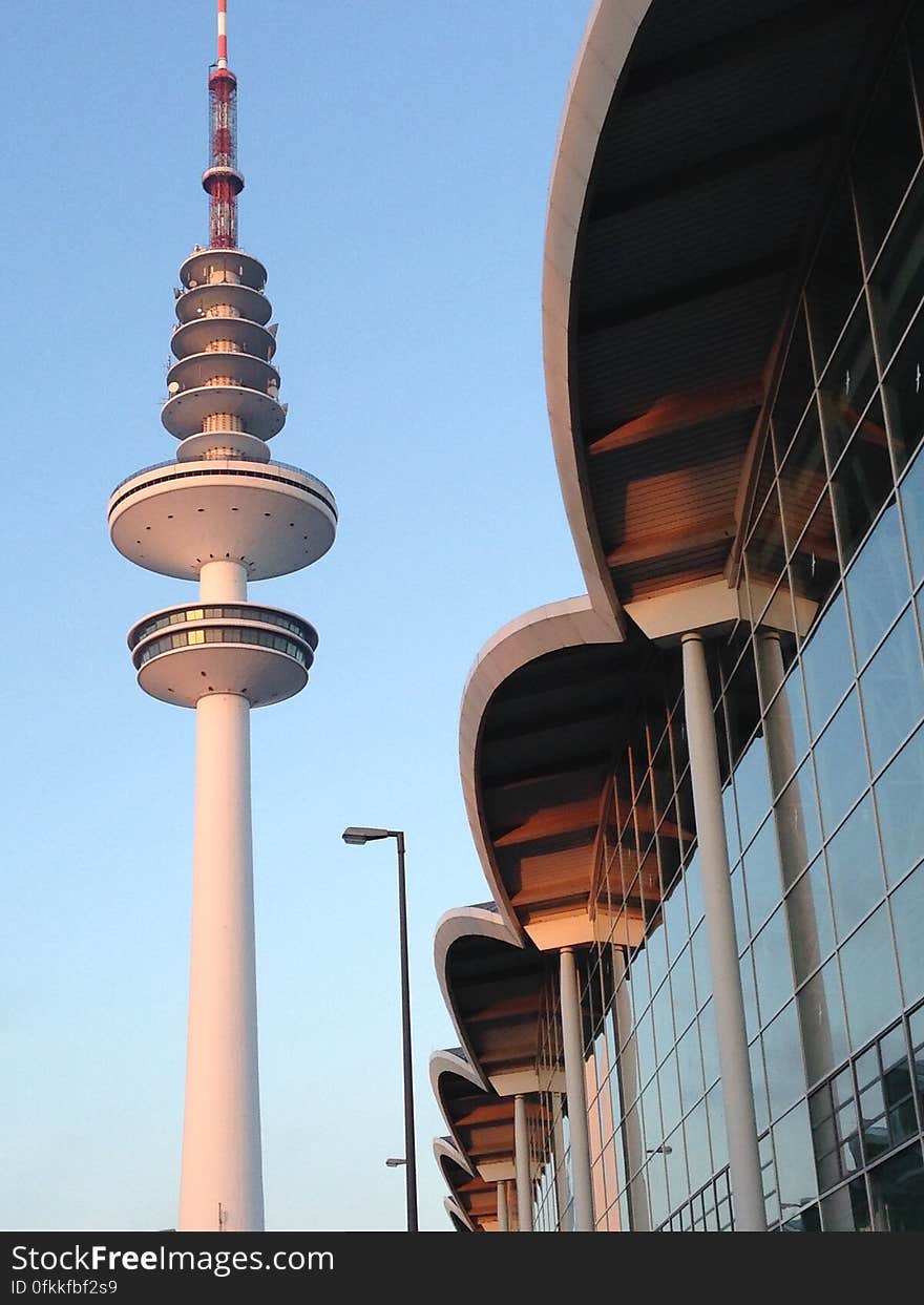 A view of the city of Hamburg and the Heinrich-Hertz-Turm at sunset. A view of the city of Hamburg and the Heinrich-Hertz-Turm at sunset.