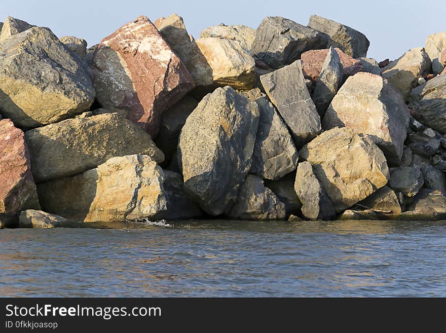 Rock breakwater structure protecting Sulina channel from strong sea waves where Danube flows into the Black Sea. Rock breakwater structure protecting Sulina channel from strong sea waves where Danube flows into the Black Sea.