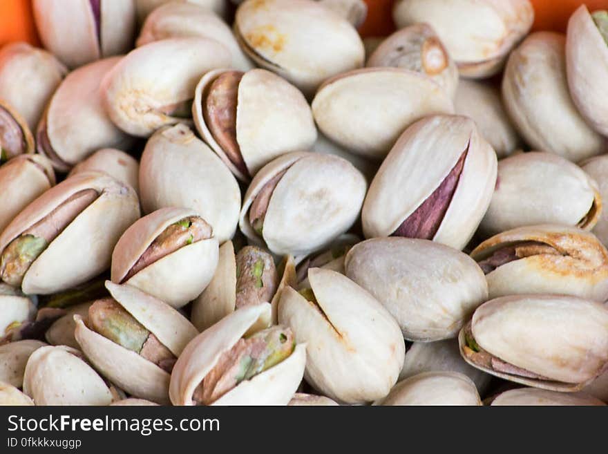 Roasted and salted pistachios in shell. They have a high content in saturated fats, proteins and fibers and are proven to reduce heart diseases. Roasted and salted pistachios in shell. They have a high content in saturated fats, proteins and fibers and are proven to reduce heart diseases.