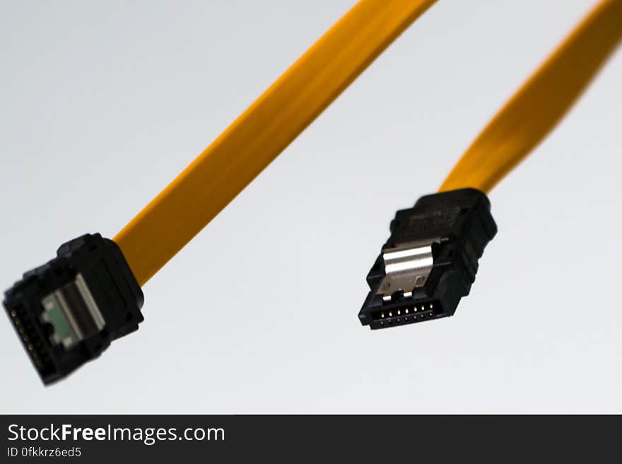 Yellow SATA cables used to transfer data to mass storage devices like optical drives and hard drives.