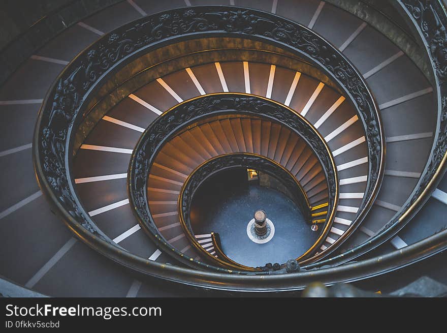 A spiraling staircase seen from above. A spiraling staircase seen from above.