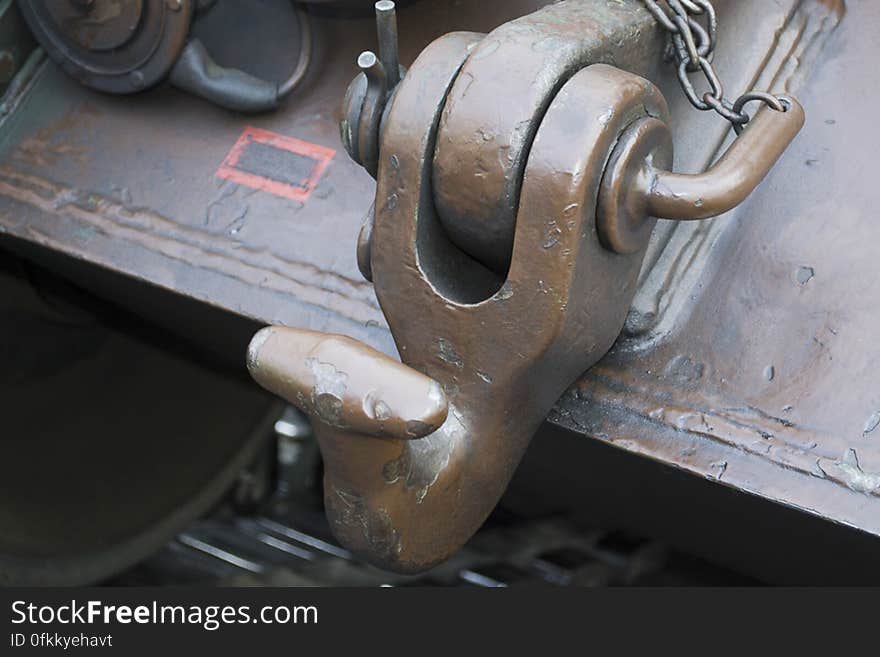 Picture of a towing hook bolted on a tank frame.