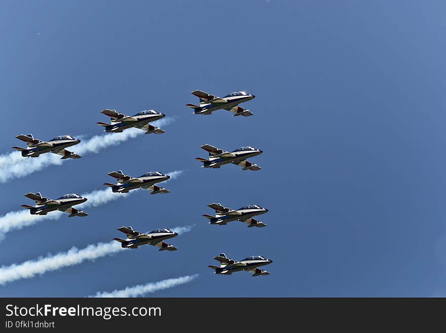 Frecce Tricolori flying in close wedge formation. Frecce Tricolori flying in close wedge formation.