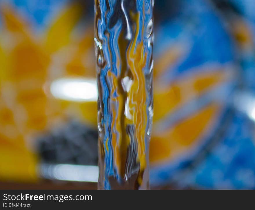 water-flow-by-blue-and-yellow-tile