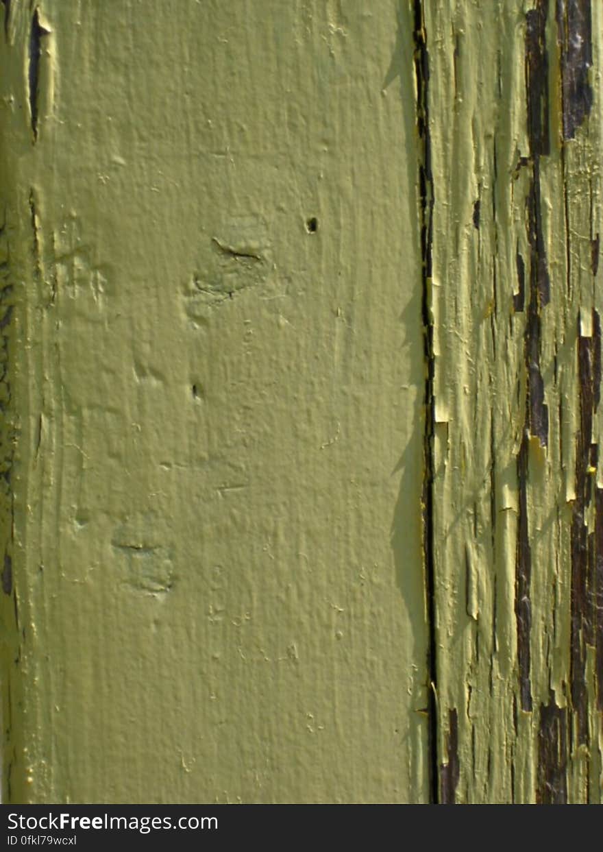 yellow-paint-peeling-off-wood