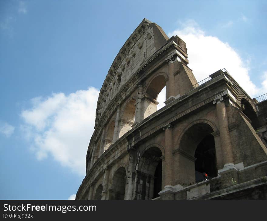 broken-wall-of-the-colloseum-against-clouds