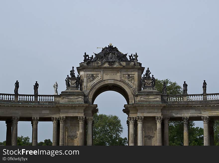 Decorative collonade with statuary, joining the two corps of the Communs in Potsdam. Decorative collonade with statuary, joining the two corps of the Communs in Potsdam.