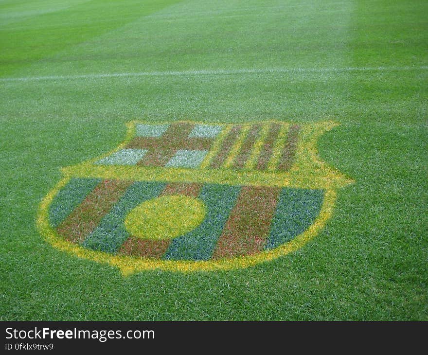 fc-barcelona-emblem-on-stadium-turf