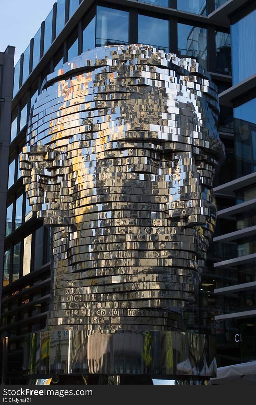 Artwork composed of 42 layers of steel that rotate and reflect light representing Czech famous writer Franz Kafka. Artwork composed of 42 layers of steel that rotate and reflect light representing Czech famous writer Franz Kafka.