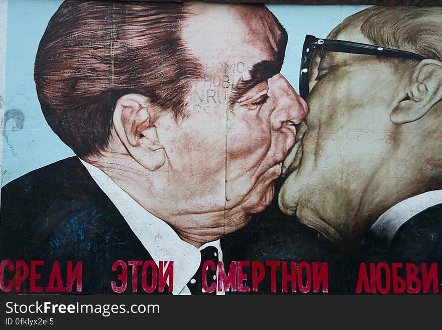 Representative graffiti art on Berlin Wall, My God, Help Me to Survive This Deadly Love by russian Dmitri Vrubel depicts Erich Honecker and Leonid Brezhnev cele. Representative graffiti art on Berlin Wall, My God, Help Me to Survive This Deadly Love by russian Dmitri Vrubel depicts Erich Honecker and Leonid Brezhnev cele