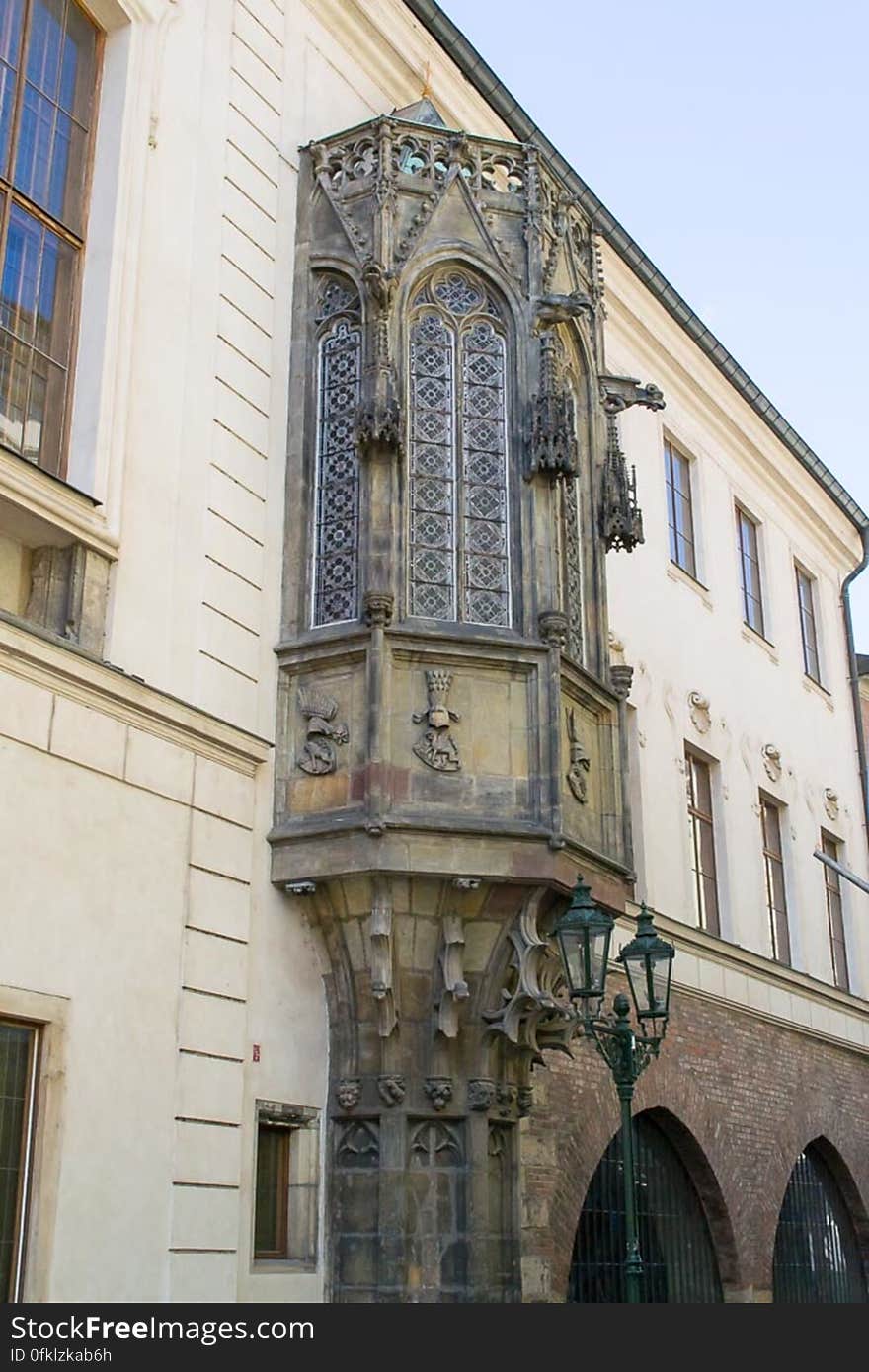 This oriel window was part of the Charles University chapel. It is ornated with gargoyles, coats of armes and other Gothic decorations. This oriel window was part of the Charles University chapel. It is ornated with gargoyles, coats of armes and other Gothic decorations.