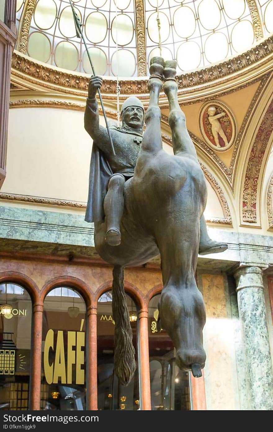 Controversial work of art representing Bohemian King Wenceslas riding a dead hose. The statue hangs from the ceiling of Lucerna Passage, close to Wenceslas squa. Controversial work of art representing Bohemian King Wenceslas riding a dead hose. The statue hangs from the ceiling of Lucerna Passage, close to Wenceslas squa