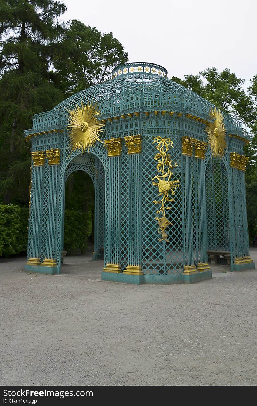 Trellised gazebo with gilded sun motifs ornaments by Sanssouci Palace. Trellised gazebo with gilded sun motifs ornaments by Sanssouci Palace.