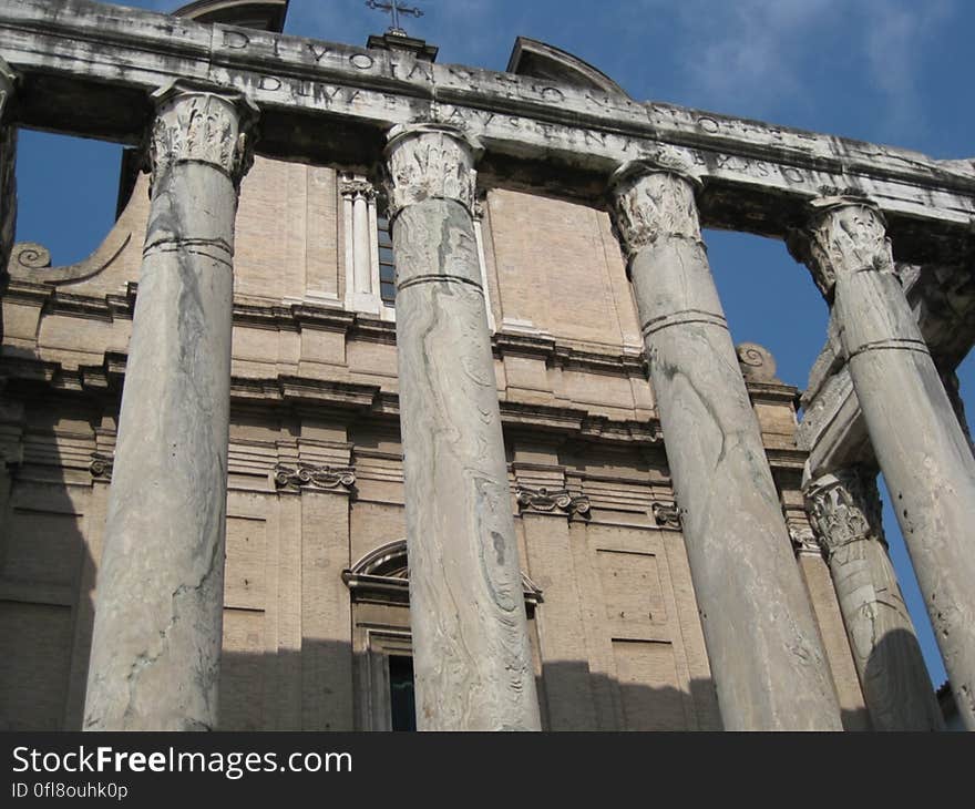 Exterior of a historical building with classical style columns. Exterior of a historical building with classical style columns.