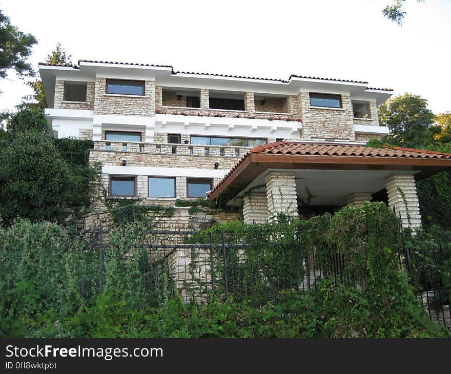 A modern style stone house. A modern style stone house.