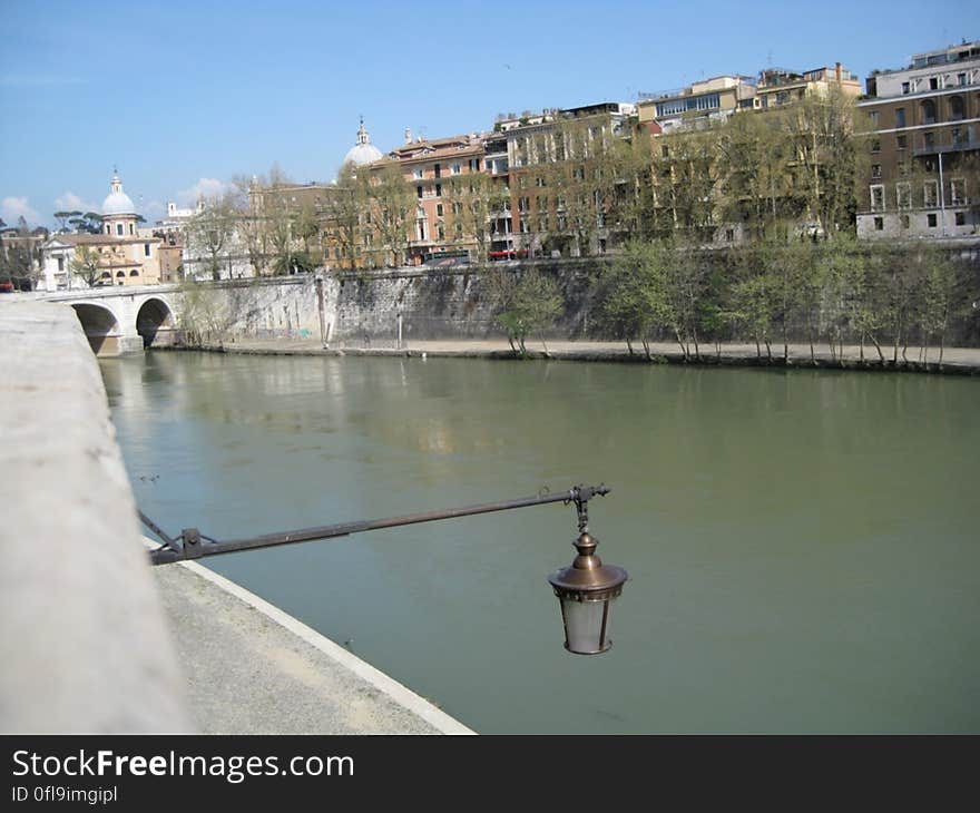 A view of a river passing through a city. A view of a river passing through a city.