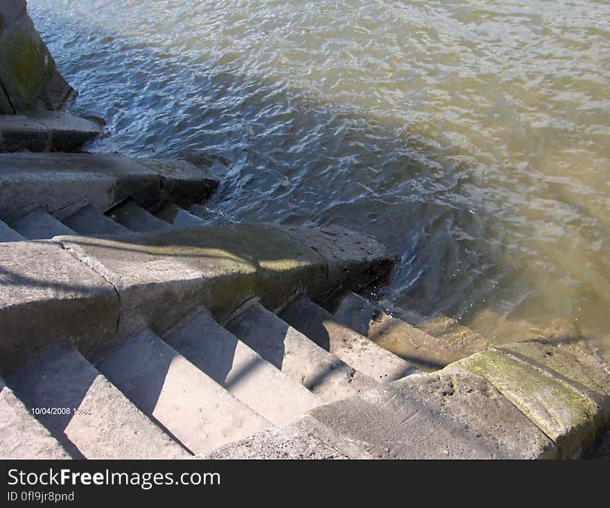 A staircase leading into the sea. A staircase leading into the sea.