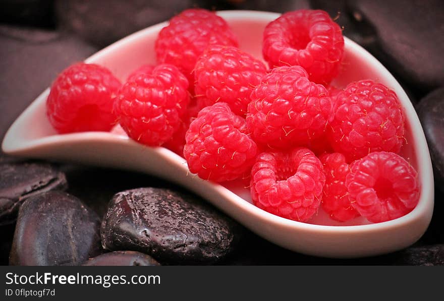 Red Raspberry Fruit on White Ceramic Tray