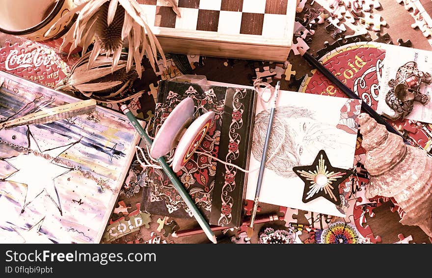 Still life collage of vintage materials and games.