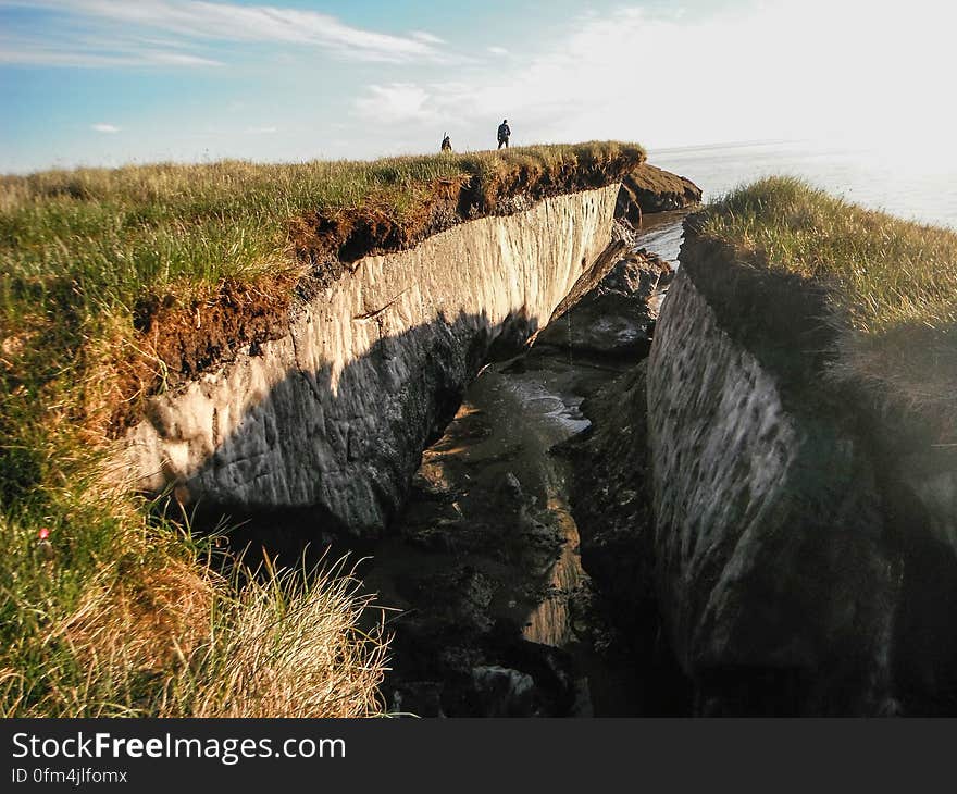 Coastal erosion reveals the extent of ice-rich permafrost underlying active layer on the Arctic Coastal Plain in the Teshekpuk Lake Special Area of the National Petroleum Reserve - Alaska. Credit: Brandt Meixell, USGS