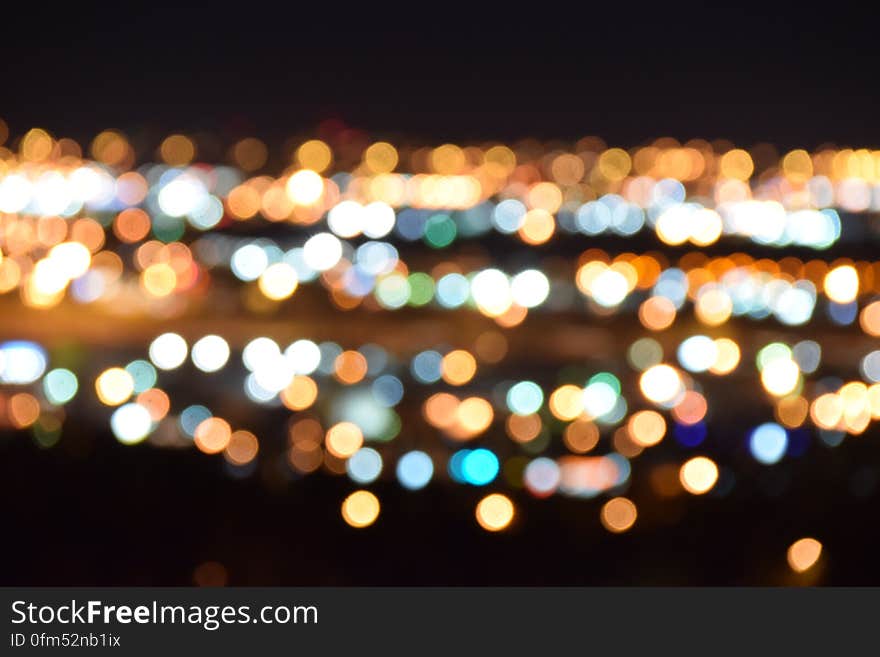 An abstract blur of city lights at night. An abstract blur of city lights at night.