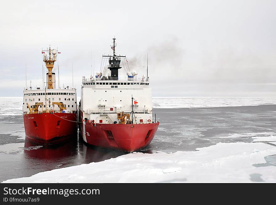 ARCTIC OCEAN â€“ The Canadian Coast Guard Ship Louis S. St-Laurent ties up to the Coast Guard Cutter Healy in the Arctic Ocean Sept. 5, 2009. The two ships are taking part in a multi-year, multi-agency Arctic survey that will help define the Arctic continental shelf. Photo Credit: Patrick Kelley, U.S. Coast Guard. ARCTIC OCEAN â€“ The Canadian Coast Guard Ship Louis S. St-Laurent ties up to the Coast Guard Cutter Healy in the Arctic Ocean Sept. 5, 2009. The two ships are taking part in a multi-year, multi-agency Arctic survey that will help define the Arctic continental shelf. Photo Credit: Patrick Kelley, U.S. Coast Guard