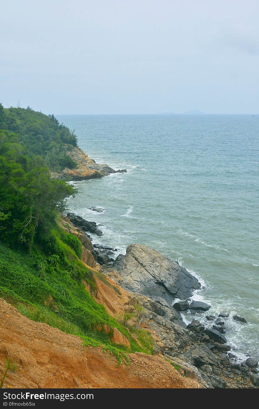 A place near Yangjiang, Guangdong i guess. Typical summer weather in Guangdong, hot and humid like those you get in pre-typhoon days. Took this &#x22;Cliche&#x22;, boring landscape shot while having a family trip. I left the rest of the gears on my car so all i have was a Nikkor AI-S 28-85 f3.5-4.5 while walking down the coast. Good lens though, classic. A place near Yangjiang, Guangdong i guess. Typical summer weather in Guangdong, hot and humid like those you get in pre-typhoon days. Took this &#x22;Cliche&#x22;, boring landscape shot while having a family trip. I left the rest of the gears on my car so all i have was a Nikkor AI-S 28-85 f3.5-4.5 while walking down the coast. Good lens though, classic.