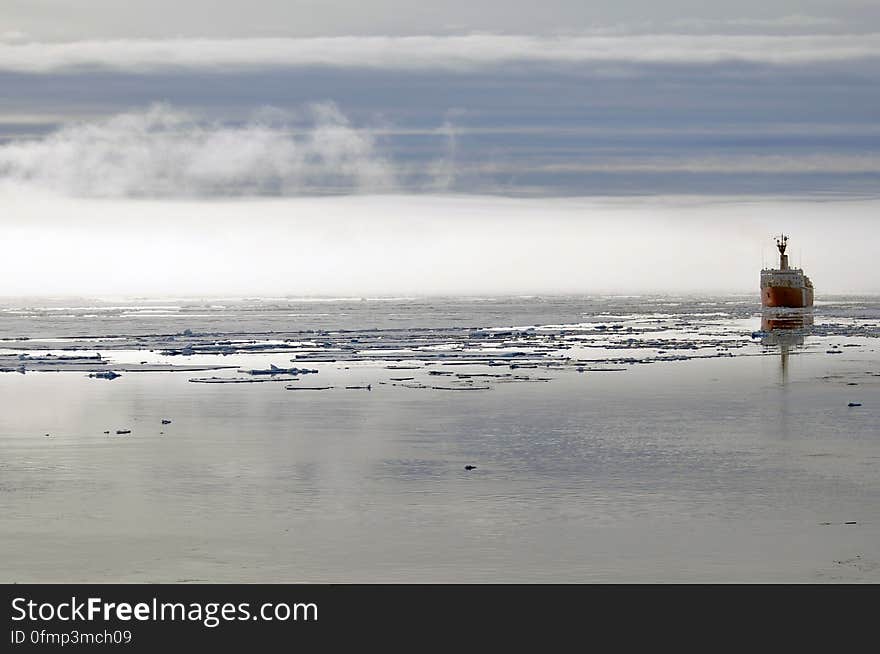 ARCTIC OCEAN - The Canadian Coast Guard Ship Louis S. St-Laurent trails the Coast Guard Cutter Healy as the two ships work their way farther north to research the floor of the Arctic Ocean Aug. 19, 2009. Photo Credit: Patrick Kelley, U.S. Coast Guard. ARCTIC OCEAN - The Canadian Coast Guard Ship Louis S. St-Laurent trails the Coast Guard Cutter Healy as the two ships work their way farther north to research the floor of the Arctic Ocean Aug. 19, 2009. Photo Credit: Patrick Kelley, U.S. Coast Guard