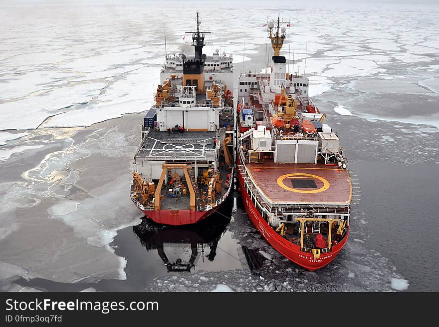 ARCTIC OCEAN – The Canadian Coast Guard Ship Louis S. St-Laurent ties up to the Coast Guard Cutter Healy in the Arctic Ocean Sept. 5, 2009. The two ships are taking part in a multi-year, multi-agency Arctic survey that will help define the Arctic continental shelf. Photo Credit: Patrick Kelley, U.S. Coast Guard. ARCTIC OCEAN – The Canadian Coast Guard Ship Louis S. St-Laurent ties up to the Coast Guard Cutter Healy in the Arctic Ocean Sept. 5, 2009. The two ships are taking part in a multi-year, multi-agency Arctic survey that will help define the Arctic continental shelf. Photo Credit: Patrick Kelley, U.S. Coast Guard