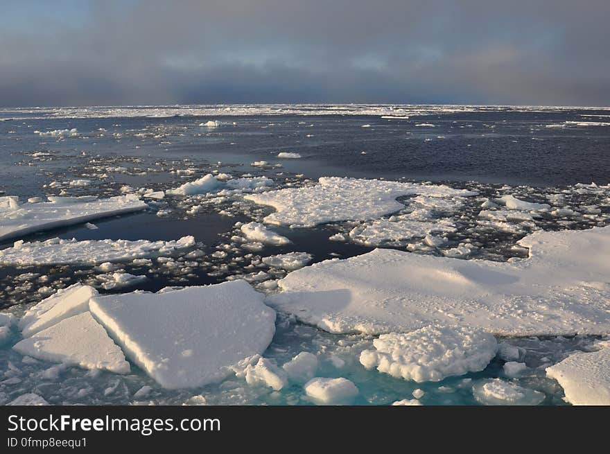 Blue sky begins to break through the clouds over Arctic Ocean ice Sept. 9, 2009. Photo Credit: Patrick Kelley, U.S. Coast Guard. Blue sky begins to break through the clouds over Arctic Ocean ice Sept. 9, 2009. Photo Credit: Patrick Kelley, U.S. Coast Guard