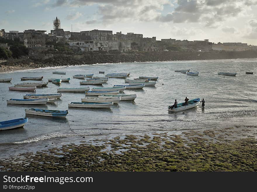 The sun rises over Mogadishu&#x27;s oldport in Somalia as a fishing boat gets ready to depart on May 22. AU UN IST PHOTO / TOBIN JONES. The sun rises over Mogadishu&#x27;s oldport in Somalia as a fishing boat gets ready to depart on May 22. AU UN IST PHOTO / TOBIN JONES.