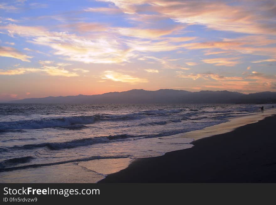 Walking along the shore on a warm summer day. Walking along the shore on a warm summer day