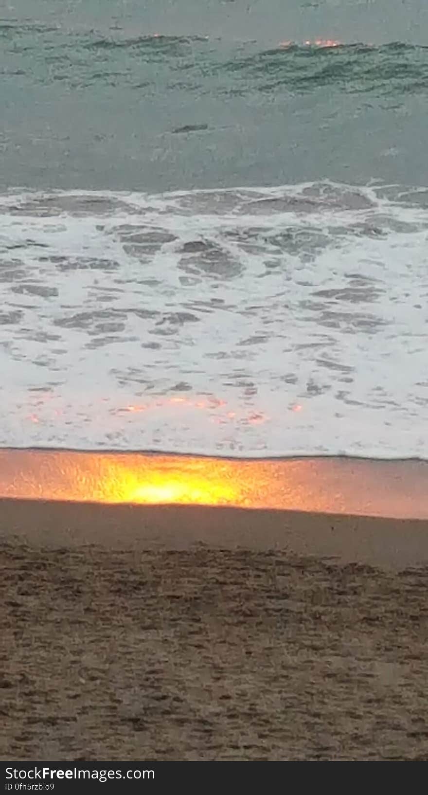 Caught the reflection of the sunset in the sand. Caught the reflection of the sunset in the sand.