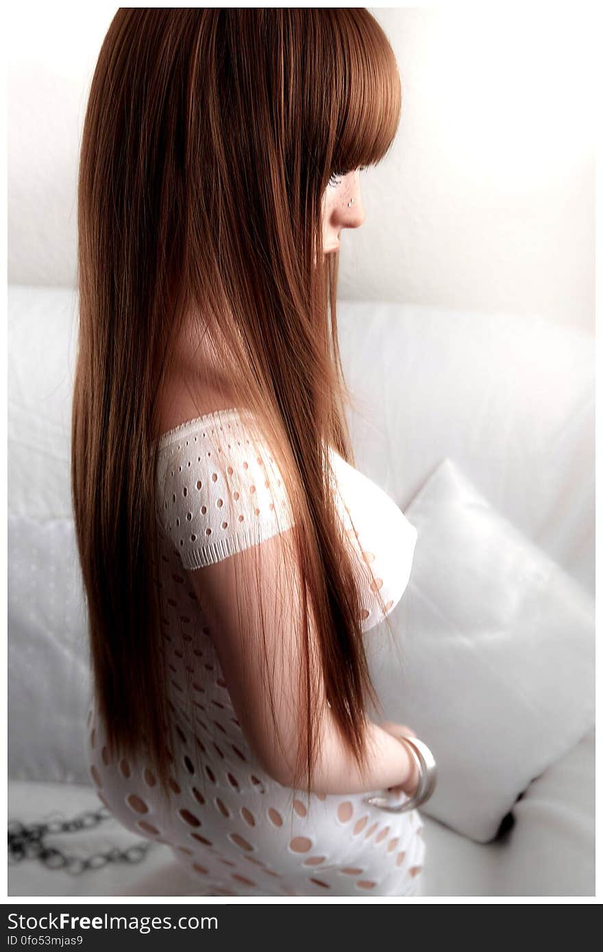 A portrait of a young brunette with long straight hair. A portrait of a young brunette with long straight hair.