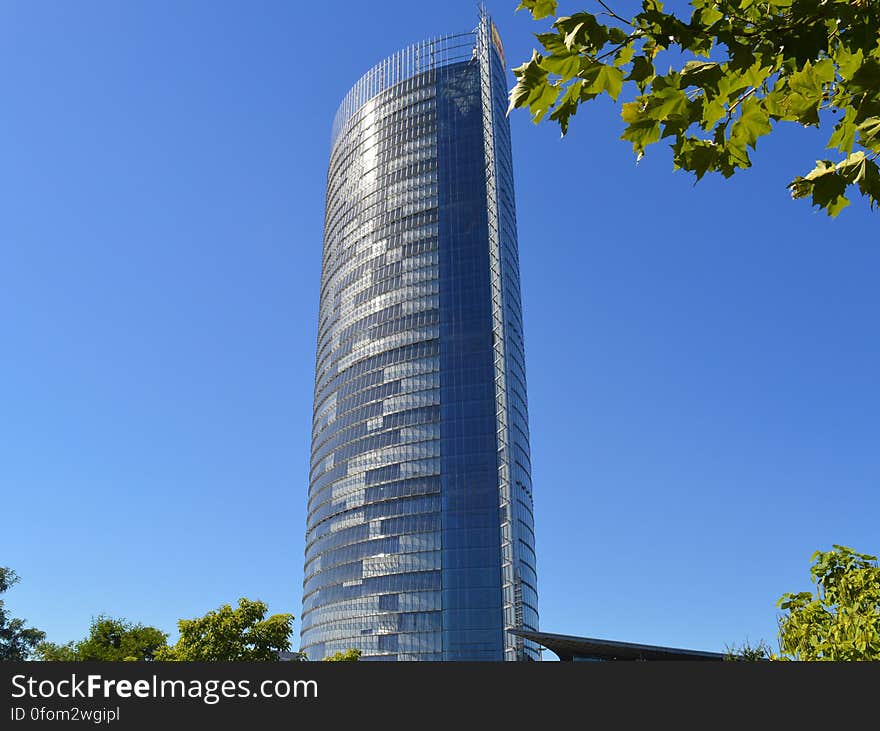 A high-rise building against the blue skies. A high-rise building against the blue skies.