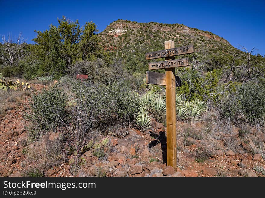 Snowmelt from a series winter storms in late January 2017 followed by rain and warm weather in February had dry creekbeds running and many of Arizona&#x27;s reservoirs filled and overflowing. Dry Beaver Creek in Woods Canyon was no exception. Woods Canyon Trail is level and unshaded as it follows a jeep road into the wide canyon mouth for 1.25 miles. The road ends and the trail continues, climbing gradually. There are views of the vegetation-covered slopes of mesas on either side. The trail enters Munds Mountain Wilderness continuing its easy climb. The trail approaches and then follows Dry Beaver Creek. At the confluence with Rattlesnake Canyon, the trail emerges onto a picturesque expanse of redrock studded with huge, gray boulders. Further down some nice redrock views as the trail climbs on a moderate grade out of the creekbed. Photo by Deborah Lee Soltesz, February 15, 2017. Credit: Coconino National Forest, U.S. Forest Service. Learn more about Woods Canyon Trail No. 93 on the Coconino National Forest.